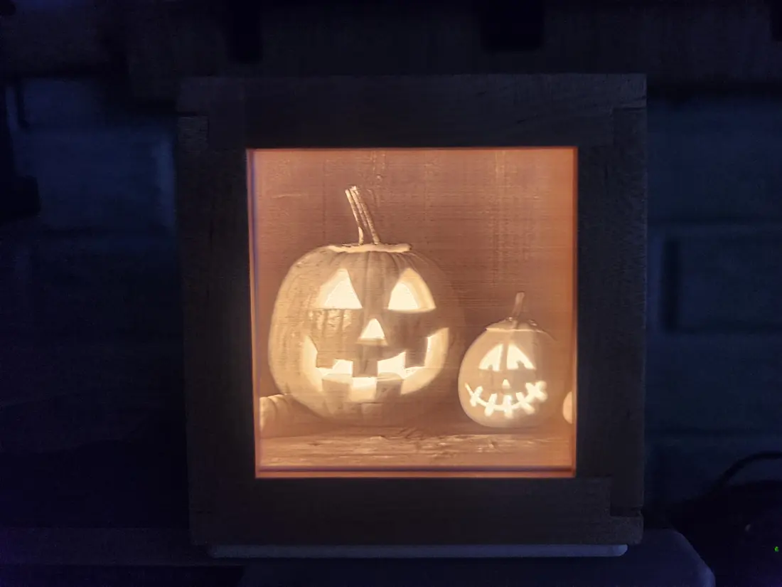 Light box showing two jack-o-lanterns